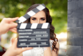 Clipboard in front of a female actor